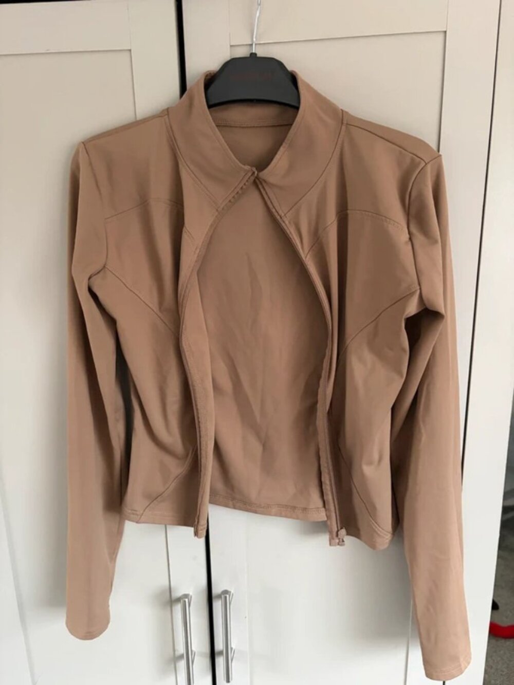 brown gym jacket